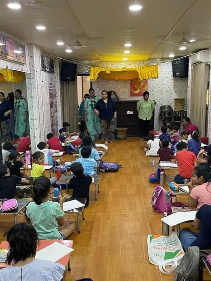 The studio is a hive of activity. This photo captures the dynamic environment of our summer camp, where learning and fun go hand in hand.