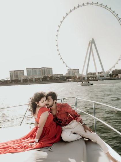 A romantic shot on a yacht with the Ain Dubai observation wheel in the background. I find unique angles to incorporate famous landmarks into your story.