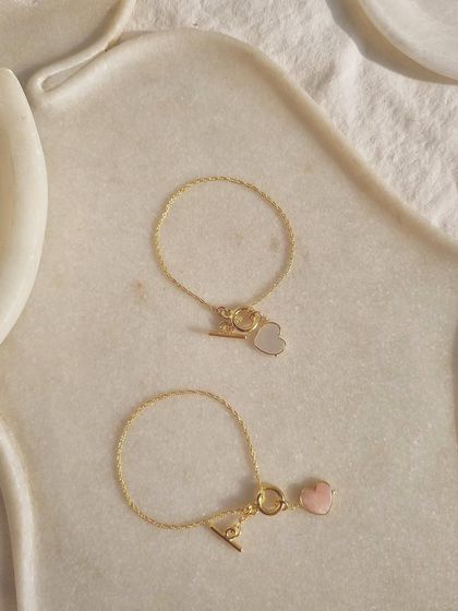 My gemstone toggle bracelets are perfect for Rakhi gifts. This image shows a Pink Opal heart and a White Moonstone heart.