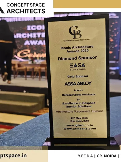 The 'Excellence in Bespoke Interior Solutions' award plaque from the Iconic Architecture Awards 2025, received at the Architecture Reconnect Summit in Delhi.