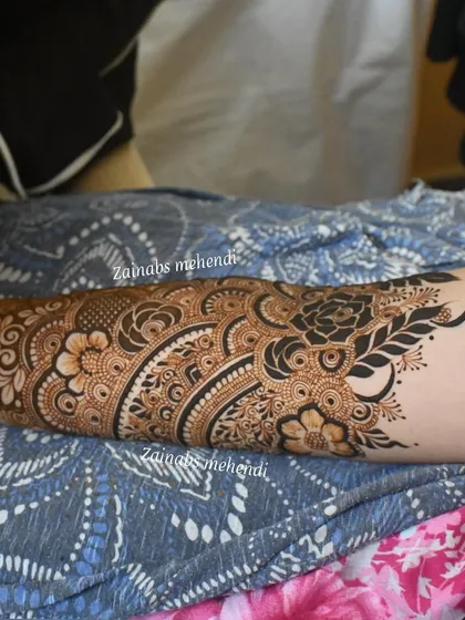 Another angle of Asba's bridal henna, showing the design from a different perspective.