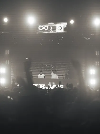 A black and white photo of the crowd and stage at IIT Patna, creating a timeless concert feel.