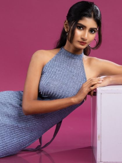 A close-up of the model, with a soft and engaging expression.