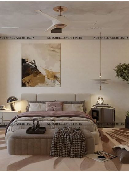 This cozy bedroom design uses warm, earthy tones and natural textures to create a welcoming retreat. An indoor tree adds a touch of nature, while the abstract art and modern furniture keep the space feeling contemporary.