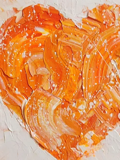 This heart is all about warmth and passion, with fiery oranges and whites swirling together. The texture is so thick you can see every mark of the palette knife. It’s a small piece that carries a lot of energy.