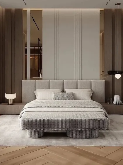A bedroom that combines wood paneling with mirrored surfaces to create a sense of depth and luxury. The design is both modern and timeless.