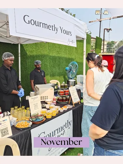 A photo from a November pop-up event, showing our team serving customers at an outdoor stall. This highlights our engagement with the local food community.