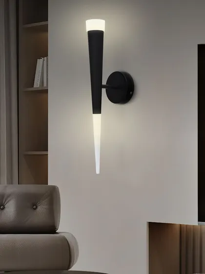 The clean, modern design of this wall sconce makes it a great choice for a living room or hallway. It provides a beautiful wash of light up and down the wall.