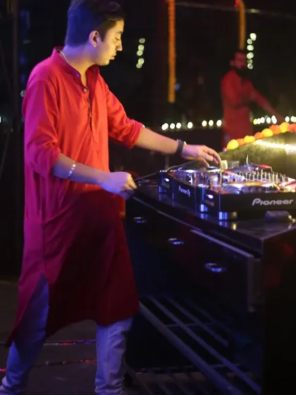 Focused on the mix during a Diwali party set. Even during festive nights, the music is my top priority.