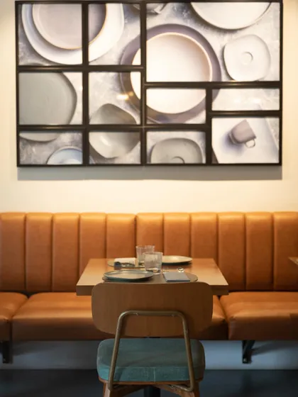 The plates that make Plats special. This photograph, which hangs in our restaurant, is an ode to the beautiful canvases we use for our culinary creations.