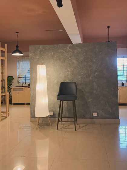 The interplay of light and shadow against our textured wall. We believe the environment you create in deeply impacts your work, so we've focused on making our studio a visually soothing space.