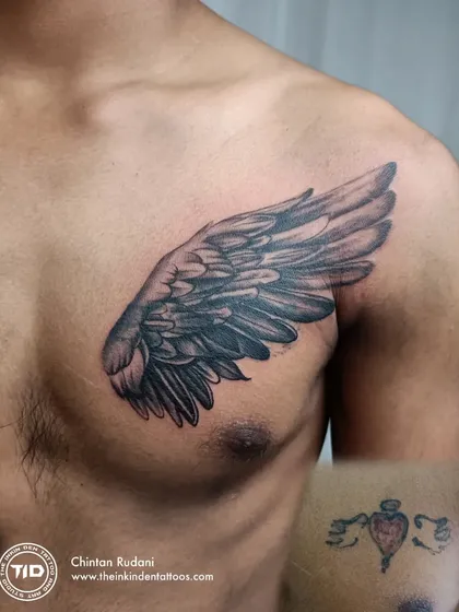 A symbol of freedom and moving forward. This detailed wing tattoo on the chest was created to cover a small, outdated design. I used layered shading to create depth and texture, ensuring the old ink is completely hidden beneath a powerful new image.