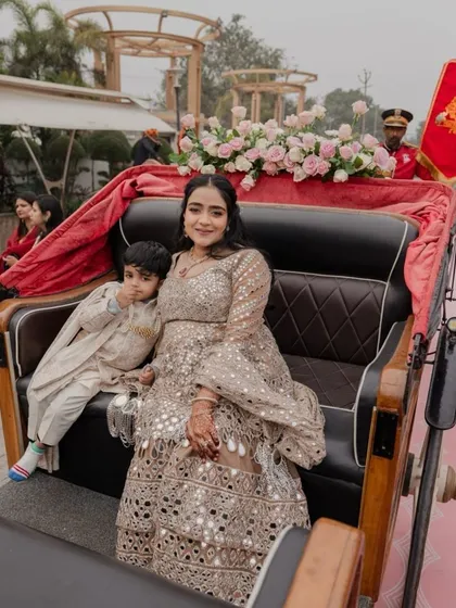 The sister of the groom and her son making their entrance in a decorated carriage. I styled her in a gorgeous mirror-work lehenga that was both glamorous and comfortable, proving that you never have to compromise on style.