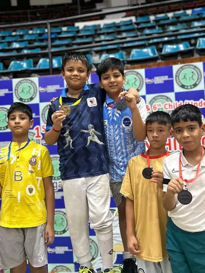 Our U-10 and U-12 fencers celebrating their victories at the Masters Nationals. Starting them young builds a strong foundation for future success.