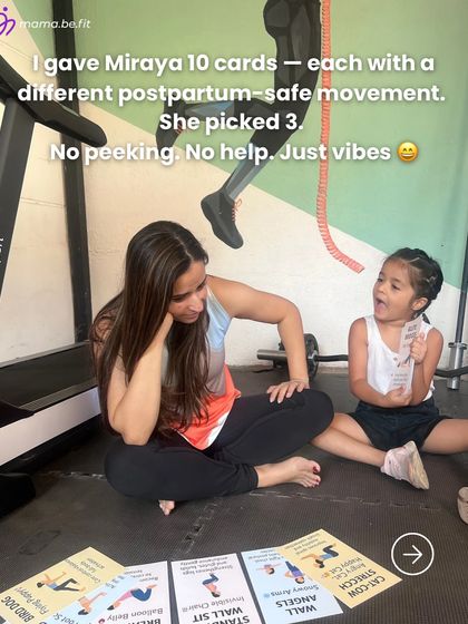 I let my daughter Miraya pick my workout for the day from these cards. She chose three, and her joy reminded me that postpartum movement is about connection.