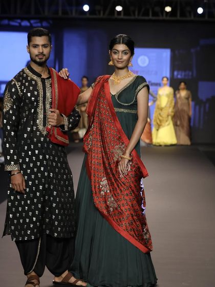 Paired with a female model to showcase a coordinated ethnic look for Joy Mitra's opening show at Bangalore Times Fashion Week.