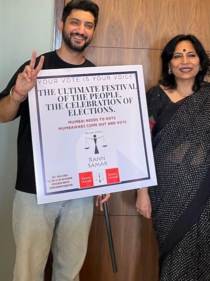 With actor Kunal Jaisingh, holding a poster for our Rann Samar Foundation's voter awareness campaign. Every vote counts in strengthening our democracy.