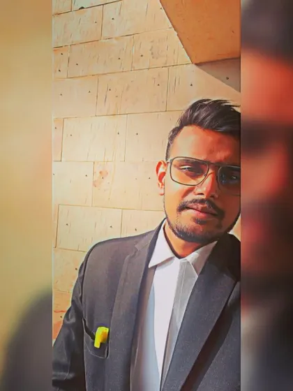 Ready for litigation at Rohini Court. My formal attire, including the black coat and white shirt, is a uniform that signifies my role as a professional officer of the court.