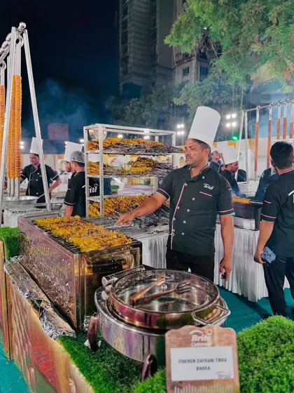 The Chicken Zafrani Tikka station, where skewers of saffron-marinated chicken are grilled and displayed, ready for guests to enjoy.