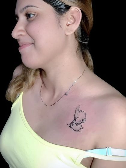 The final baby elephant tattoo, a simple and charming piece.