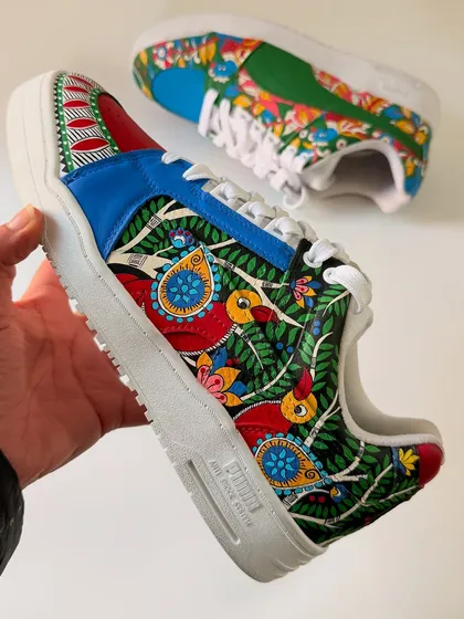 A closer look at the Kalamkari-inspired side of the custom Puma sneakers. The detail in the birds and foliage is something I spent a lot of time on, ensuring every element was precise and beautiful.