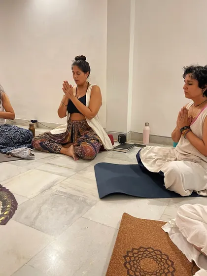 A moment of shared meditation and prayer during our "Women & the Moon" workshop. The collective energy of the group is palpable.