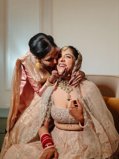 A precious, heartfelt moment between the bride and her mother. My makeup is designed to be long-lasting and tear-proof for these emotional moments.