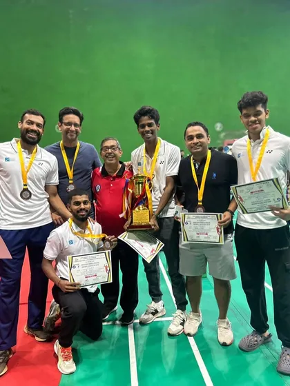 The result of dedication and expert coaching. We are incredibly proud to celebrate our players holding their well-earned trophies, medals, and certificates from various badminton tournaments.