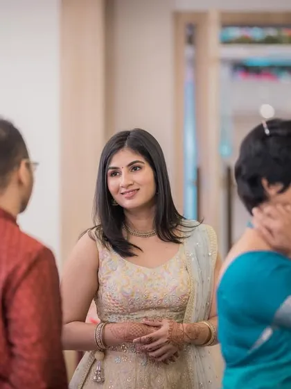The bride-to-be mingling with guests, captured in a natural, candid style.