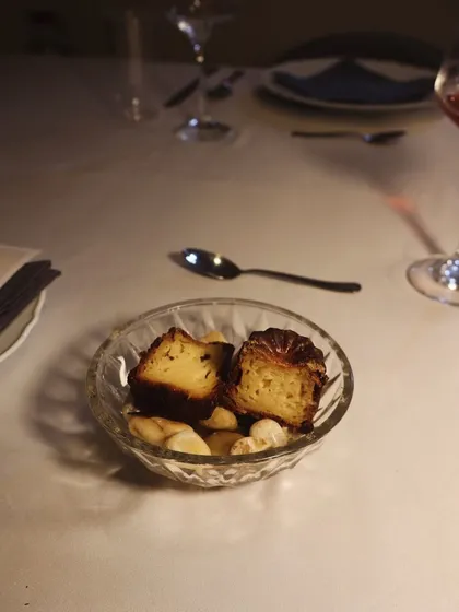 A small bowl of Canelé de Bourdeaux, served as mignardises after the main dessert course.