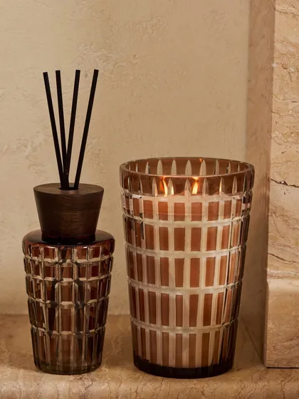 Here is the true essence of royalty captured in my Royal Mirage collection. The rich brown cut-glass vessel with its geometric pattern adds a warm, ambient light to any corner, making it a perfect piece for elegant home styling and festive decor.