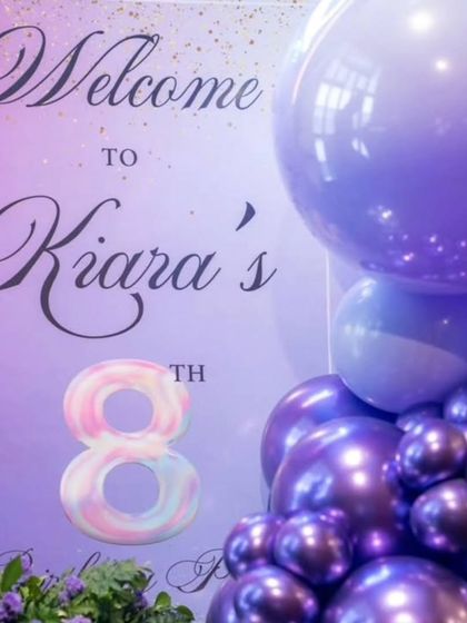A personalized welcome sign for Kiara's 8th birthday party. The purple and silver color scheme sets the tone for a fun and stylish celebration.
