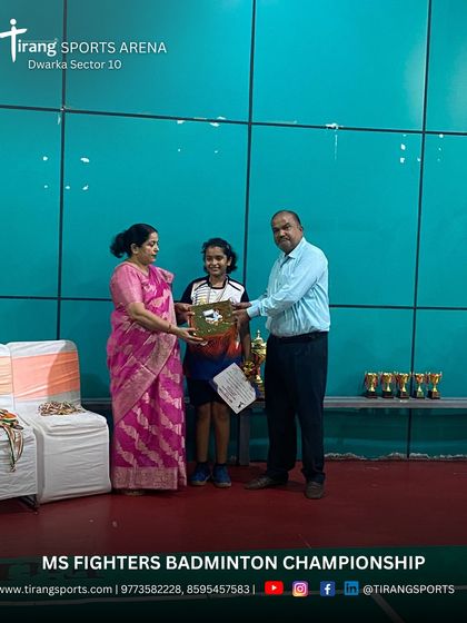 Another promising player receiving her award at the MS Fighters Championship. These events help build a strong foundation for future badminton professionals.