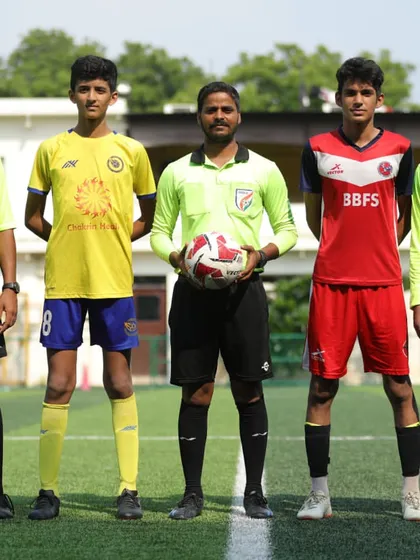 Our U15 captain stands with the opponent and match officials, representing the academy in the HCL Delhi Future Stars Youth League.