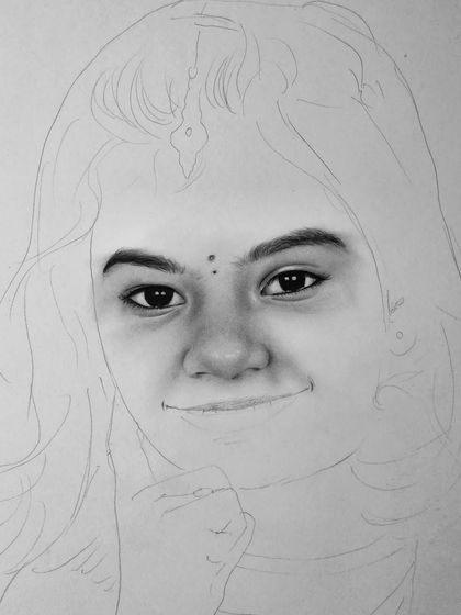A progress shot of the young girl's portrait, with the face and eyes taking shape.