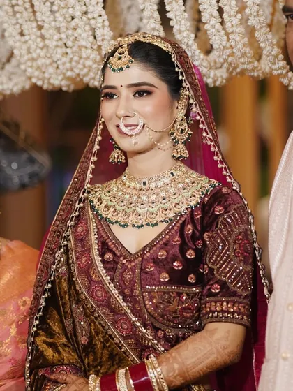 A close-up of my beautiful bride Ankita. Her makeup is soft and glowing, perfect for her velvet lehenga.