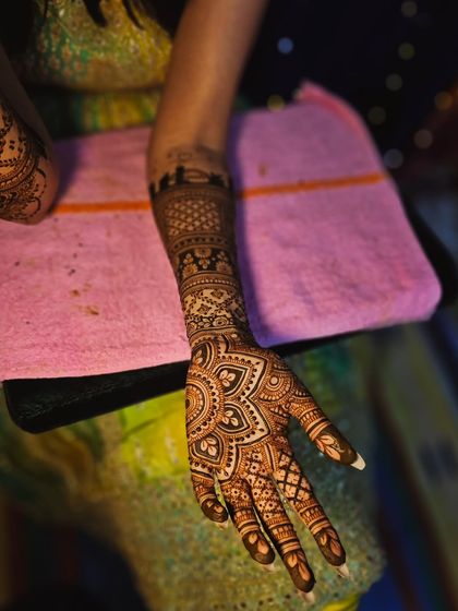 A view of the single arm, showing the full length of the design from the skyline to the fingertips.