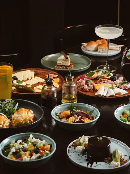 A glimpse of our lavish Sunday Brunch spread. This is more than a meal; it's a table full of stories waiting to be shared, featuring everything from fresh salads and artisanal cheese boards to decadent desserts.