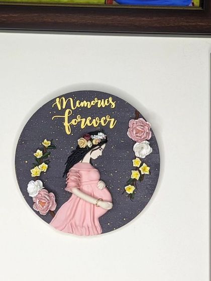 The "Memories Forever" wall art hanging in its new home. It brings me so much joy to see my creations become a part of someone's life and space.