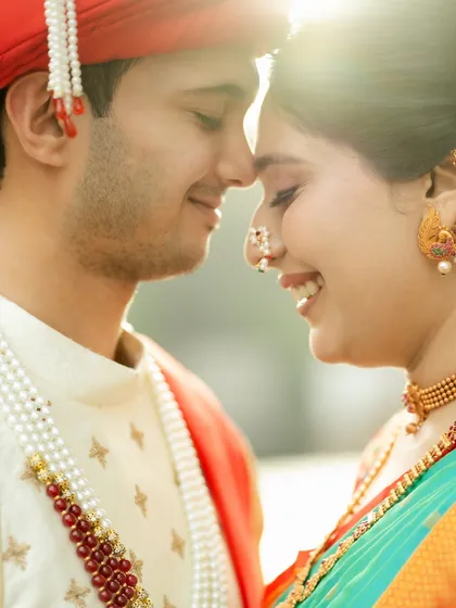 The quiet moments are just as powerful. A gentle touch, a happy smile, and beautiful backlighting make this a perfect, intimate portrait from a traditional pre-wedding session.