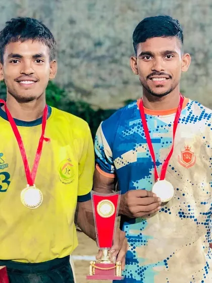 Celebrating a successful tournament with multiple trophies and medals.