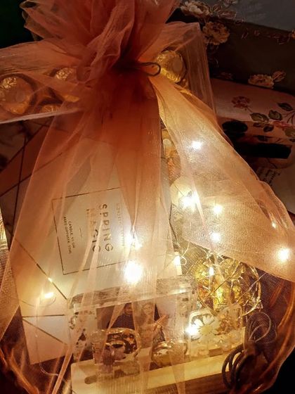 Another view of a finished gift hamper, elegantly wrapped and ready to delight someone special.