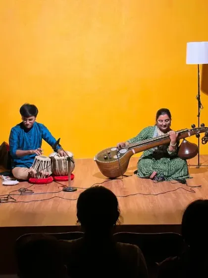 From the audience's perspective, a beautiful shot of a veena and tabla performance at Karmasthan. Our space is designed to create a close connection between artists and listeners.