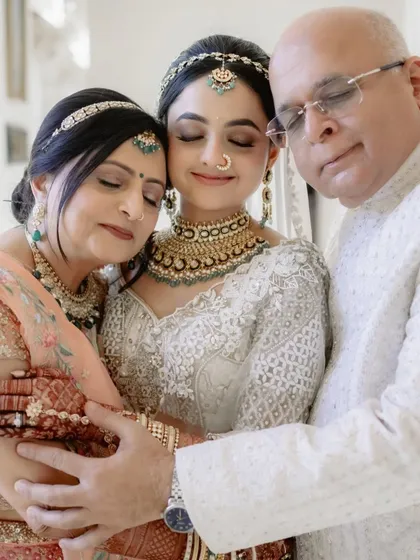 Some moments are beyond words. The quiet embrace of a bride with her parents before she begins her new journey is one of them. We ensure you have the space to live these emotions, while we handle the rest.