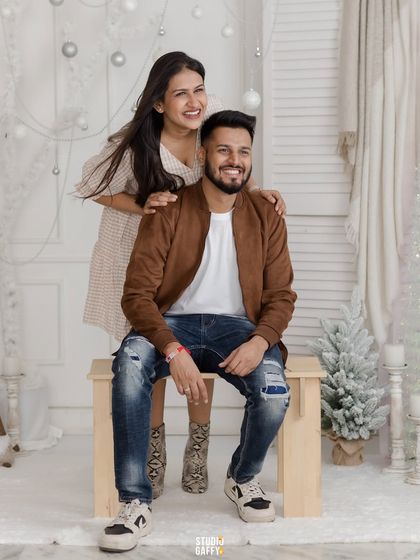 A joyful portrait of a couple during their family Christmas session.
