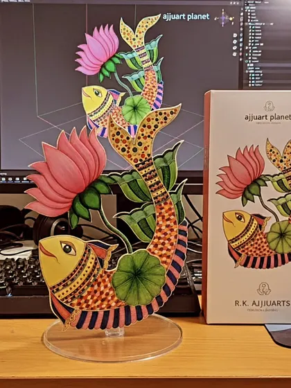 My Madhubani fish motif transformed into a beautiful tabletop decor piece. This shows how my traditional art can be adapted from a 2D painting into a 3D standee, perfect for adding a unique touch to your desk or shelf.