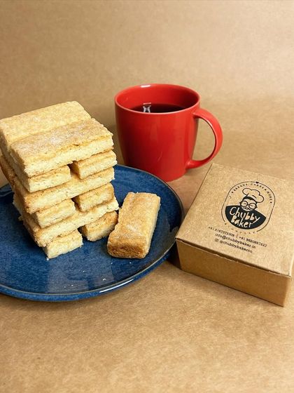 The Lasso Way Biscuits are the perfect companion for your tea, coffee, or whenever the munchies hit. These buttery shortbread biscuits crumble in your mouth and are available on Swiggy and Zomato.