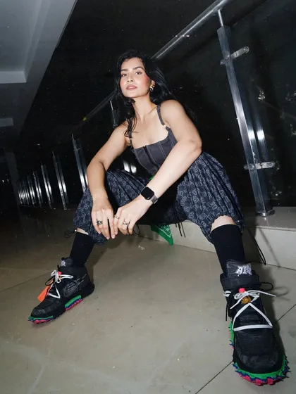 A full-length shot showcasing my streetwear style, a key element of my identity as a DJ and influencer.