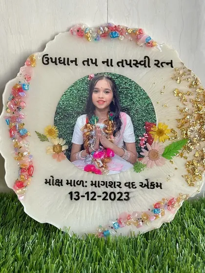 A beautiful frame to celebrate a young girl's religious achievement. The design incorporates her photo, the date, and a border of colorful crystals and gold foil.