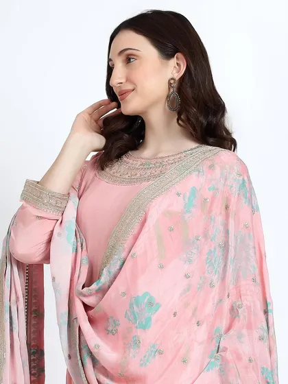 A lovely pink anarkali with a printed dupatta, a classic and comfortable choice for any festive occasion.